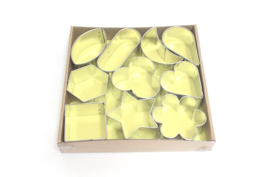 10 smooth tin shapes in carton box Calder