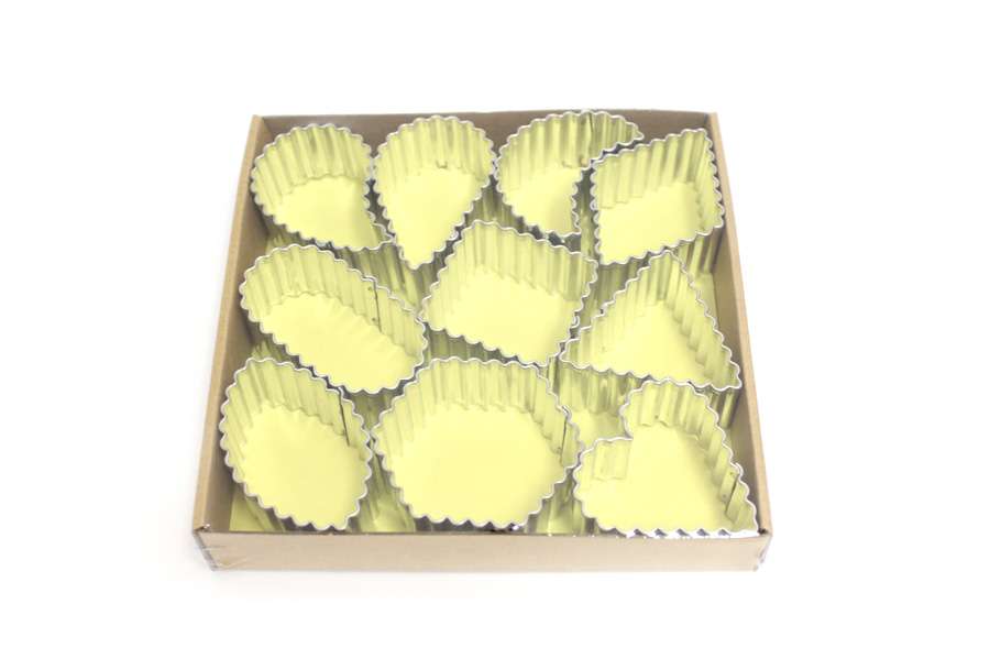 10 serrated tin shapes in carton box Calder